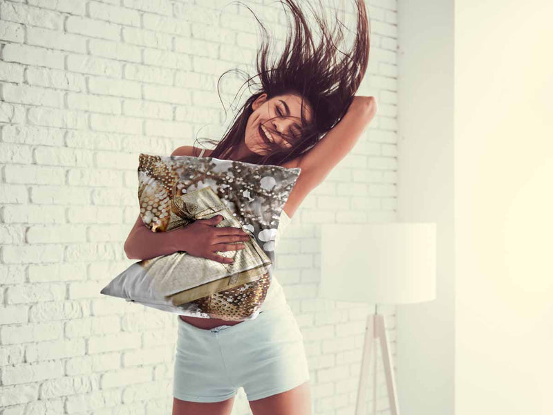 Gezondheidskussen met gouden cadeau