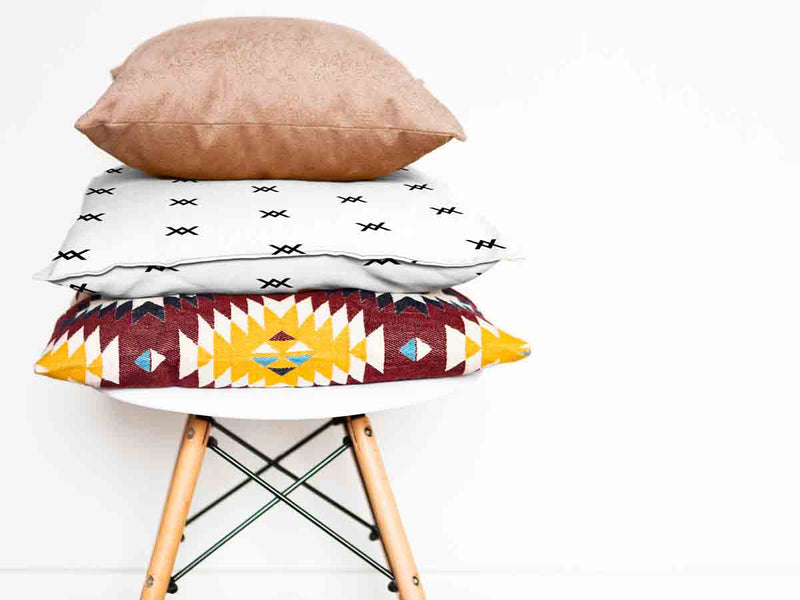 Gezondheidskussen met zwarte knoop